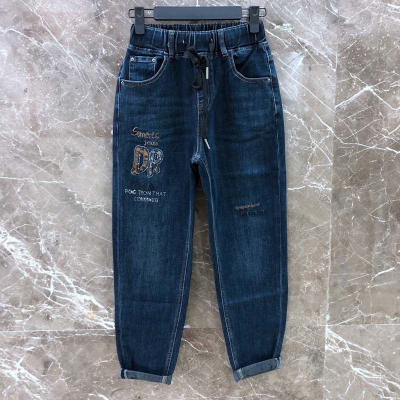 牛仔裤女蓝色松紧腰字母系带哈伦垮裤