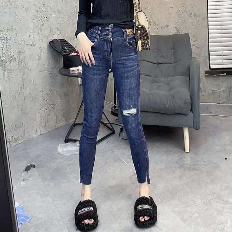高腰三排扣破洞紧身牛仔裤秋新款欧货贴标弹力九分裤小脚裤女